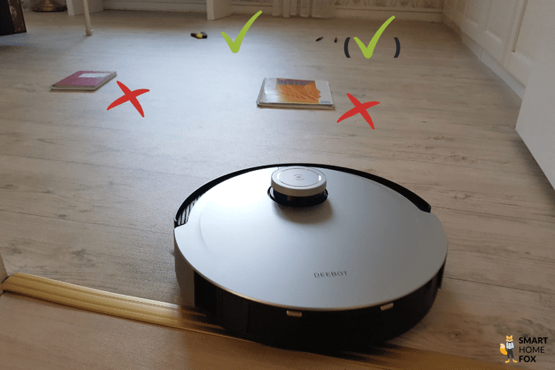 Ecovacs Deebot X1 OMNI object detection test of notebooks and pens.